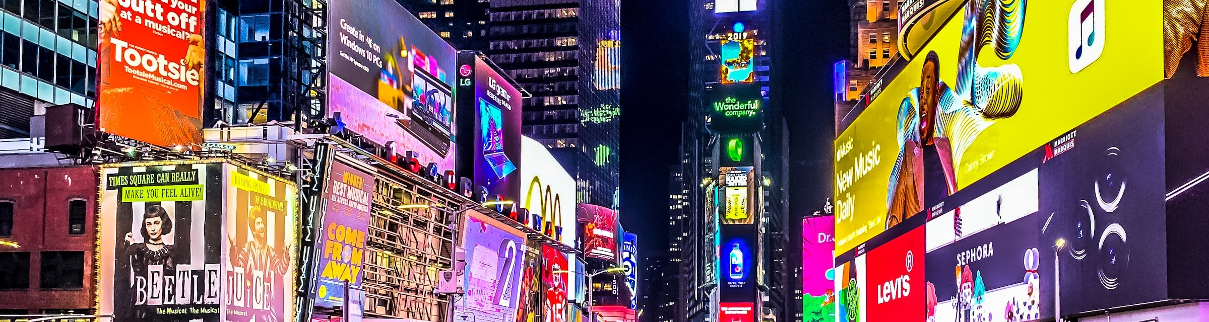 times square with lots of ads on buildings